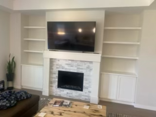 Custom built-in entertainment center in Langley crafted by Giovani Interior Millwork Inc.