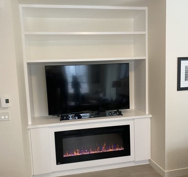 Custom built-in entertainment center in Langley crafted by Giovani Interior Millwork Inc.