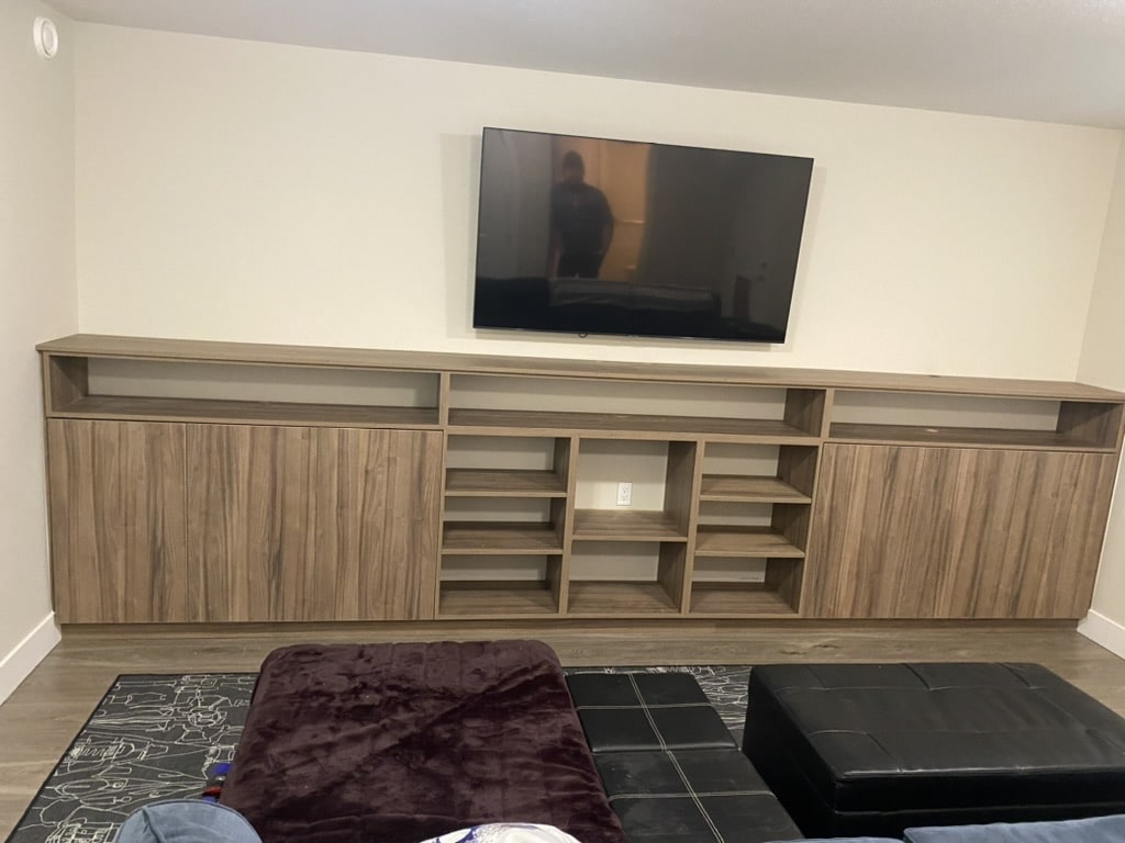 Custom built-in entertainment center in Langley crafted by Giovani Interior Millwork Inc.