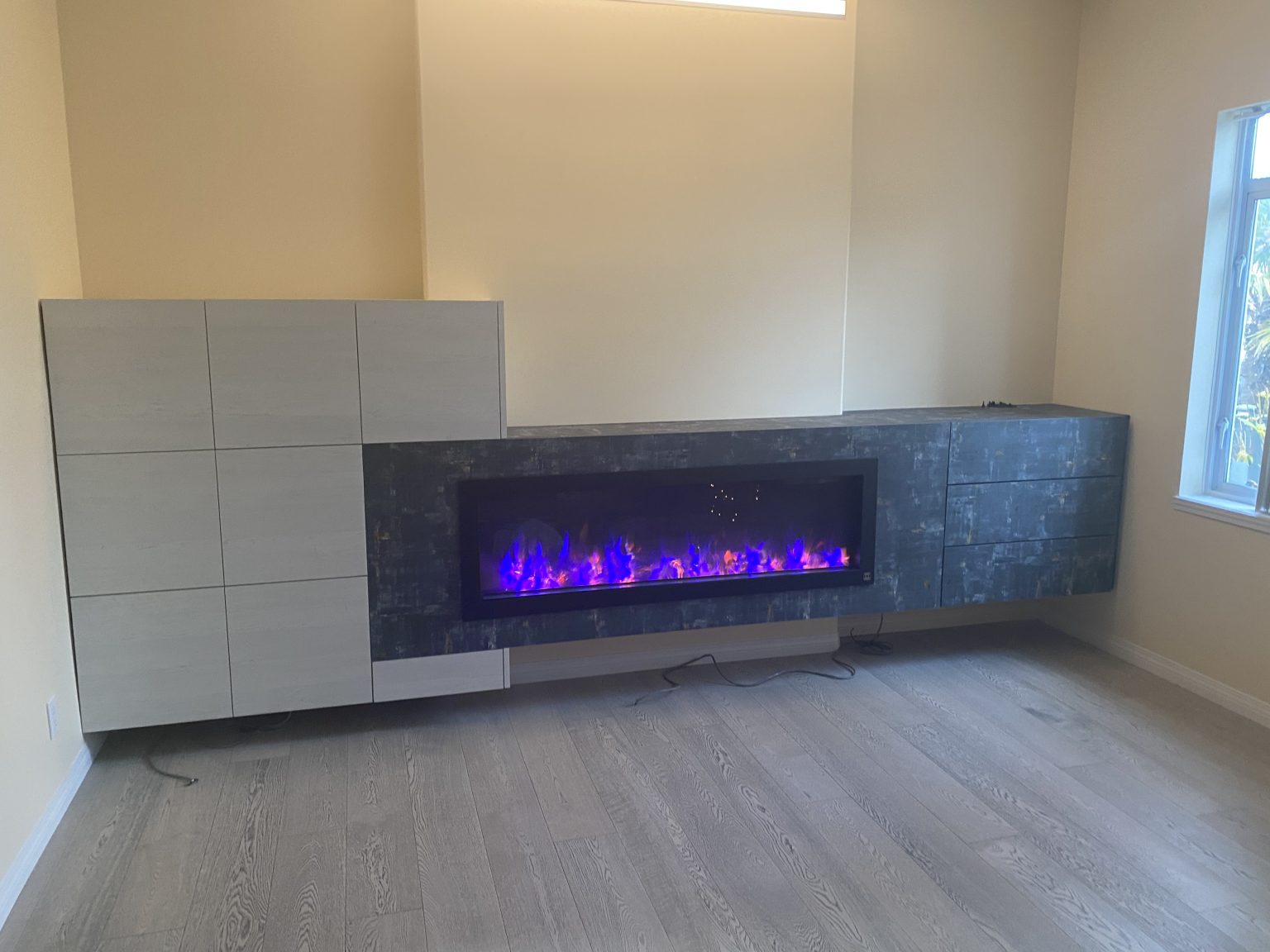 Custom built-in entertainment center in Langley crafted by Giovani Interior Millwork Inc.